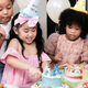 Kids eating cake at birthday party